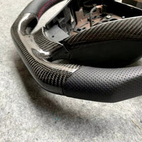 🏁 Kierownica z prawdziwego włókna węglowego + skóra
BMW Seria 5 E60 / E61 (2003–2010)