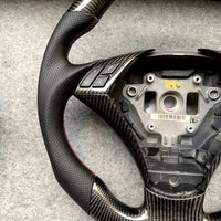 🏁 Kierownica z prawdziwego włókna węglowego + skóra
BMW Seria 5 E60 / E61 (2003–2010)